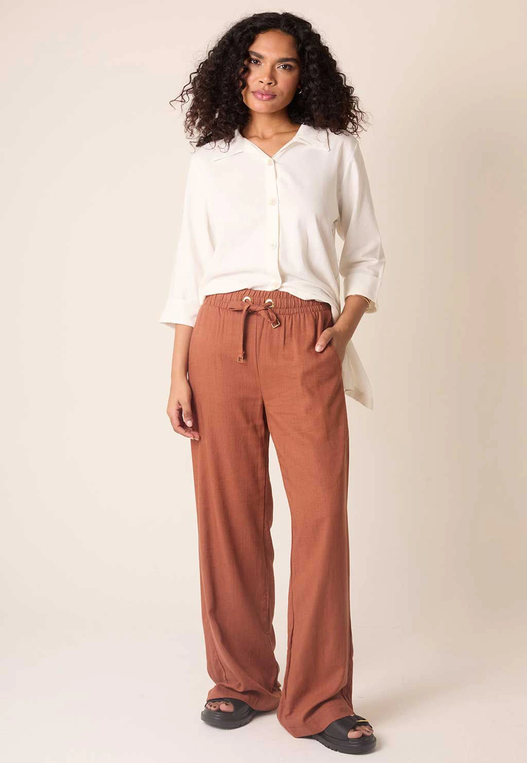 Calça de Linho Pantalona Com Cós Alto