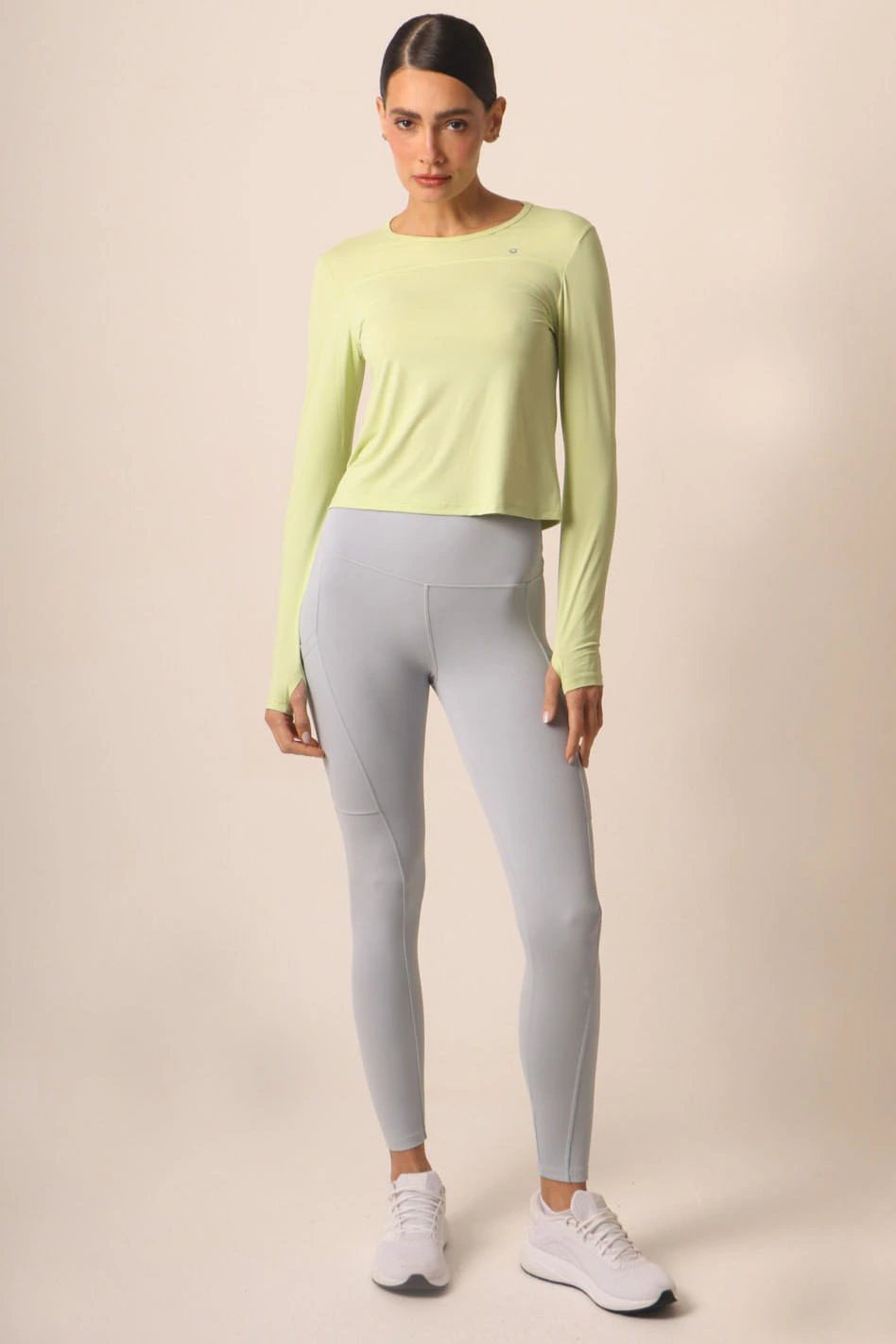Calça Legging Compress com Bolsos Funcionais e Recorte