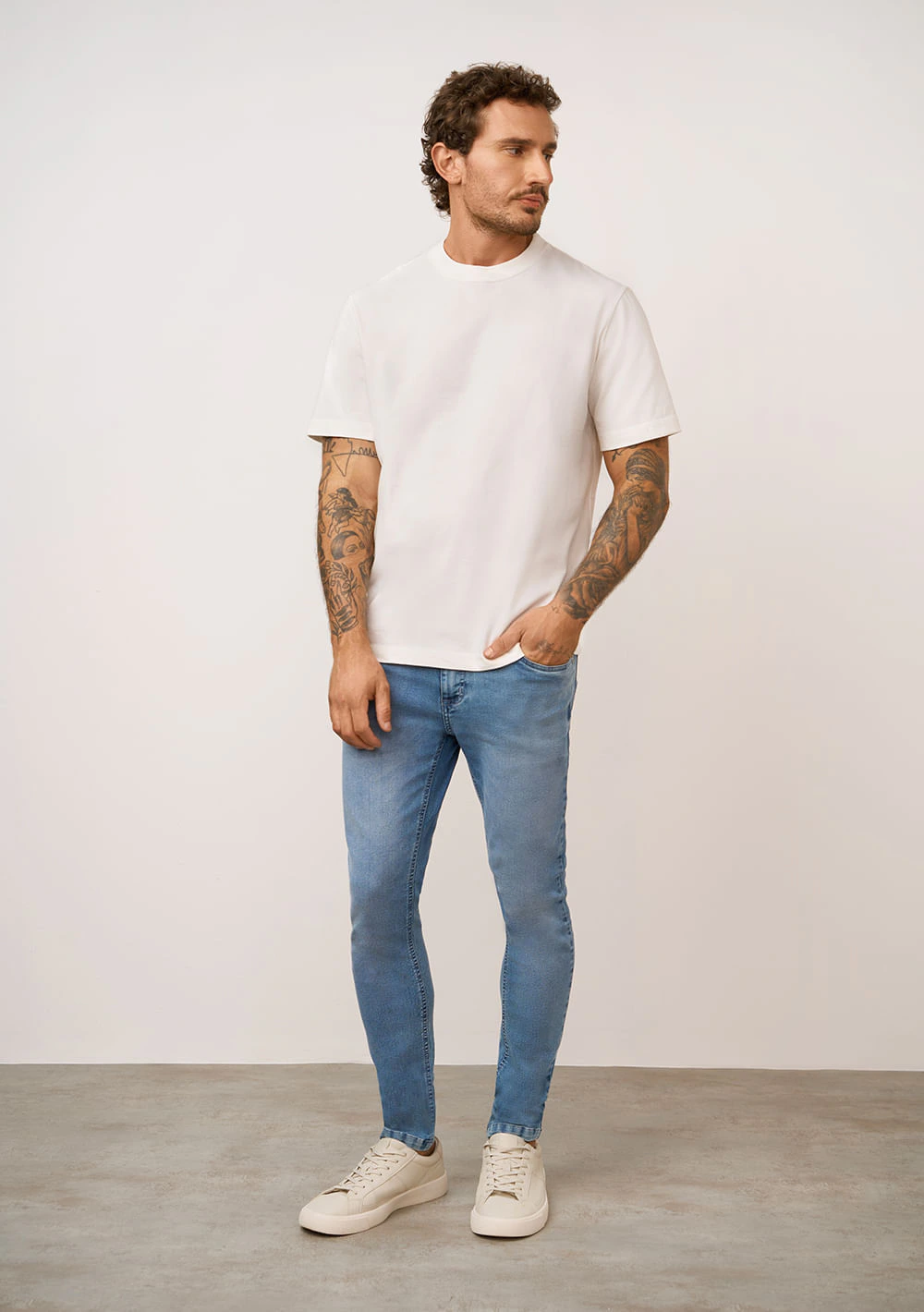 Calça Skinny Cós Baixo Bolso Relogio Jeans