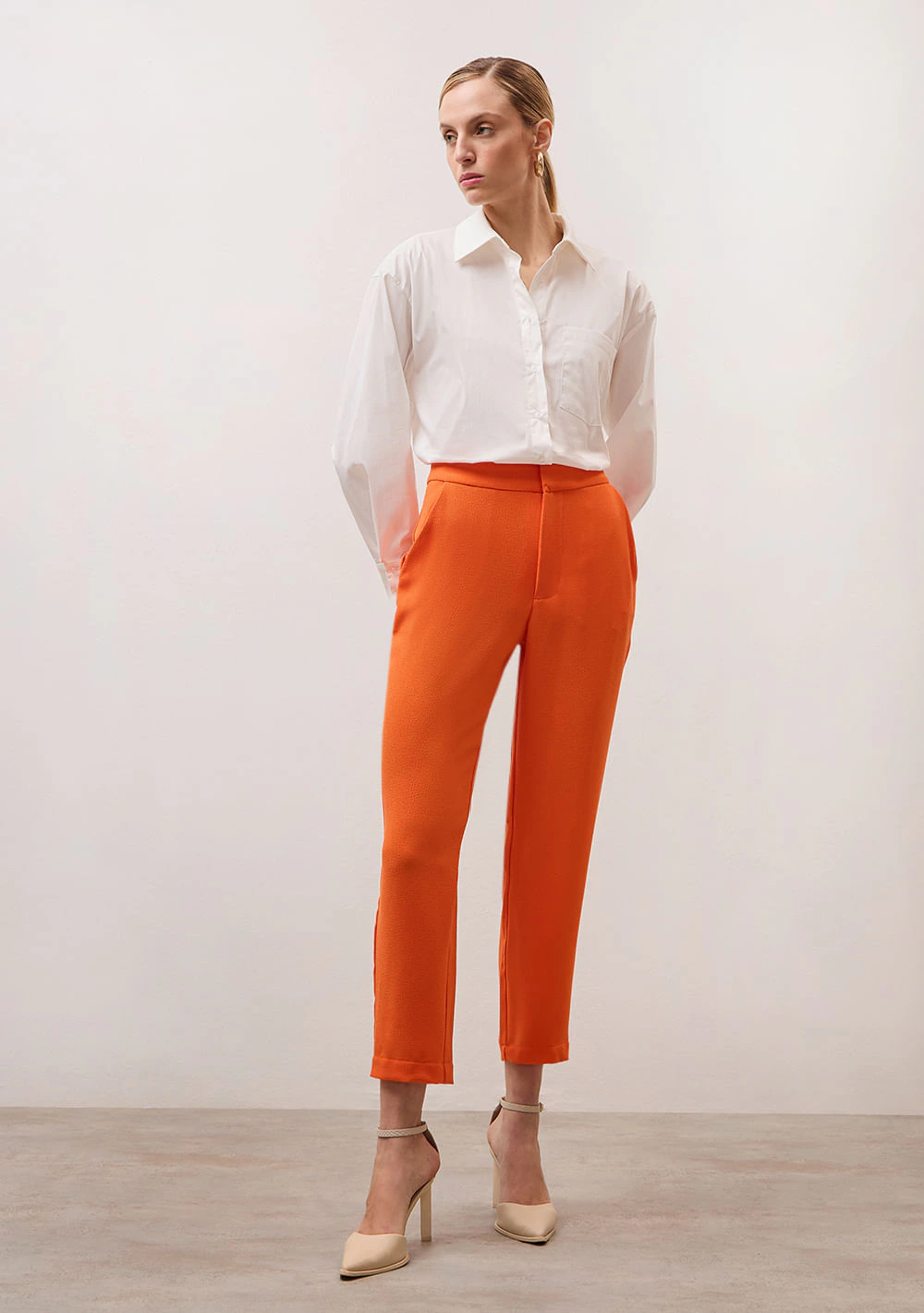 Calça Iódice Slim Cós Alto Bolso Faca Laranja